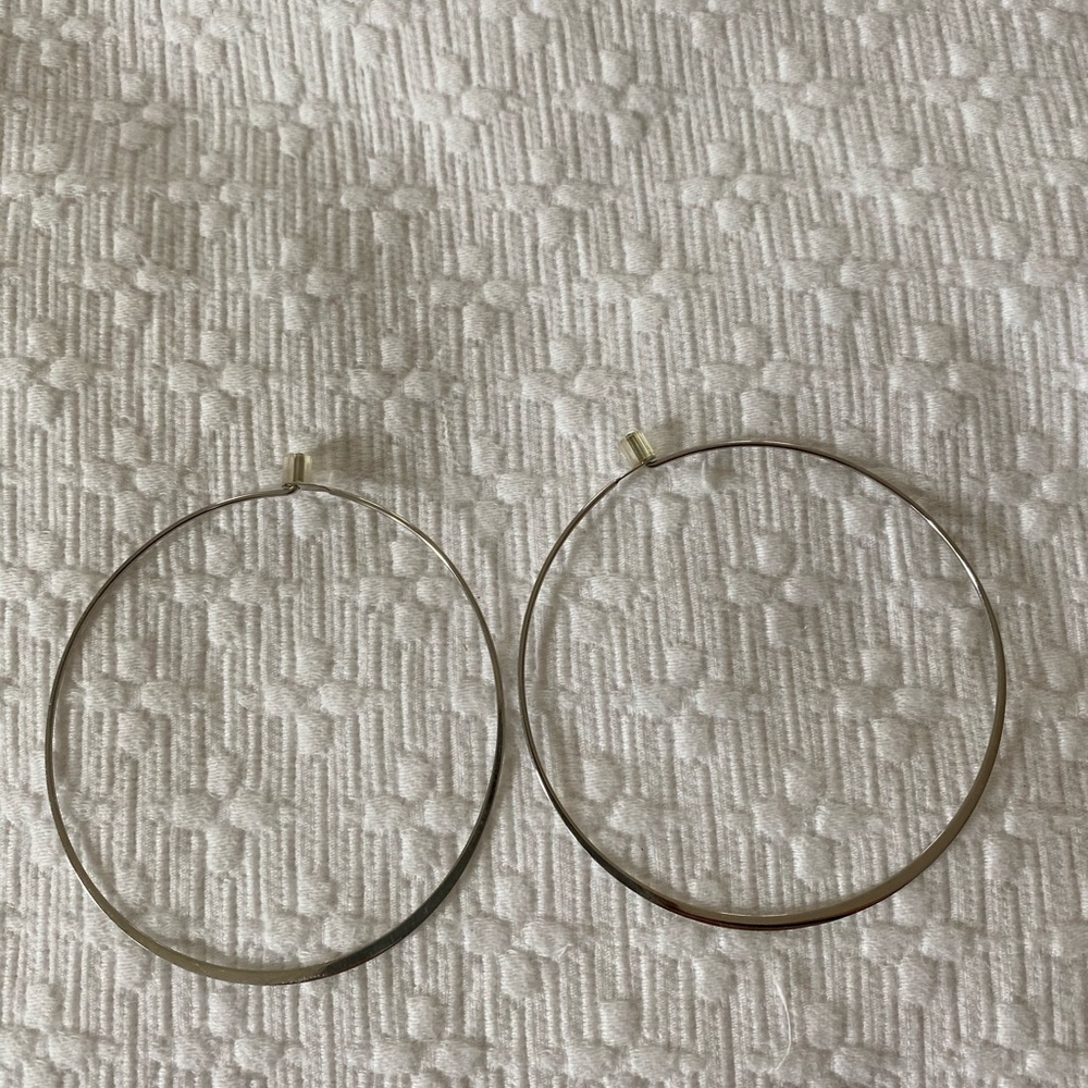 Michael Kors hoop earrings.